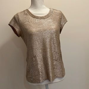 Seemed back, metallic gold top with texture